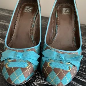 Pretty in Plaid shoes. Not Rated brand size 9. Fun and in good shape.